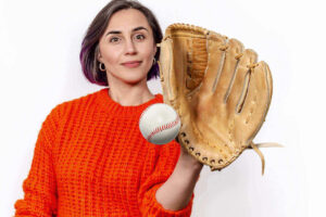 Image of woman with catcher's mit catching baseball for Cisco's 'Play Catch not Ping Pong' case study on Catalynk Blog page